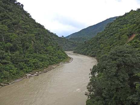 A monsoon-swoolen Teesta emerges from the mountains